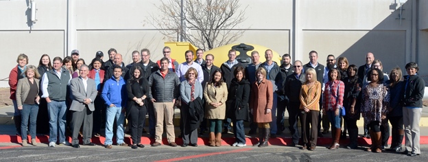 Amarillo and Canyon business leaders in front of a replica of the first atomic bomb, Fat Man