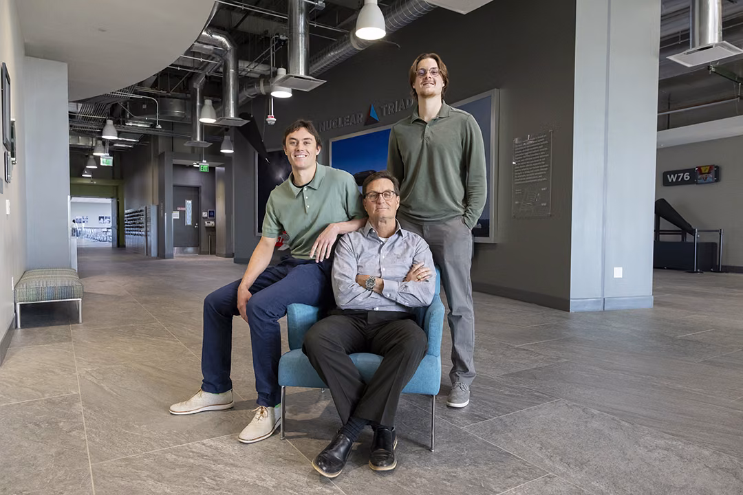 From left: Landon, Kyle and Connor Bräck pose for a family photo